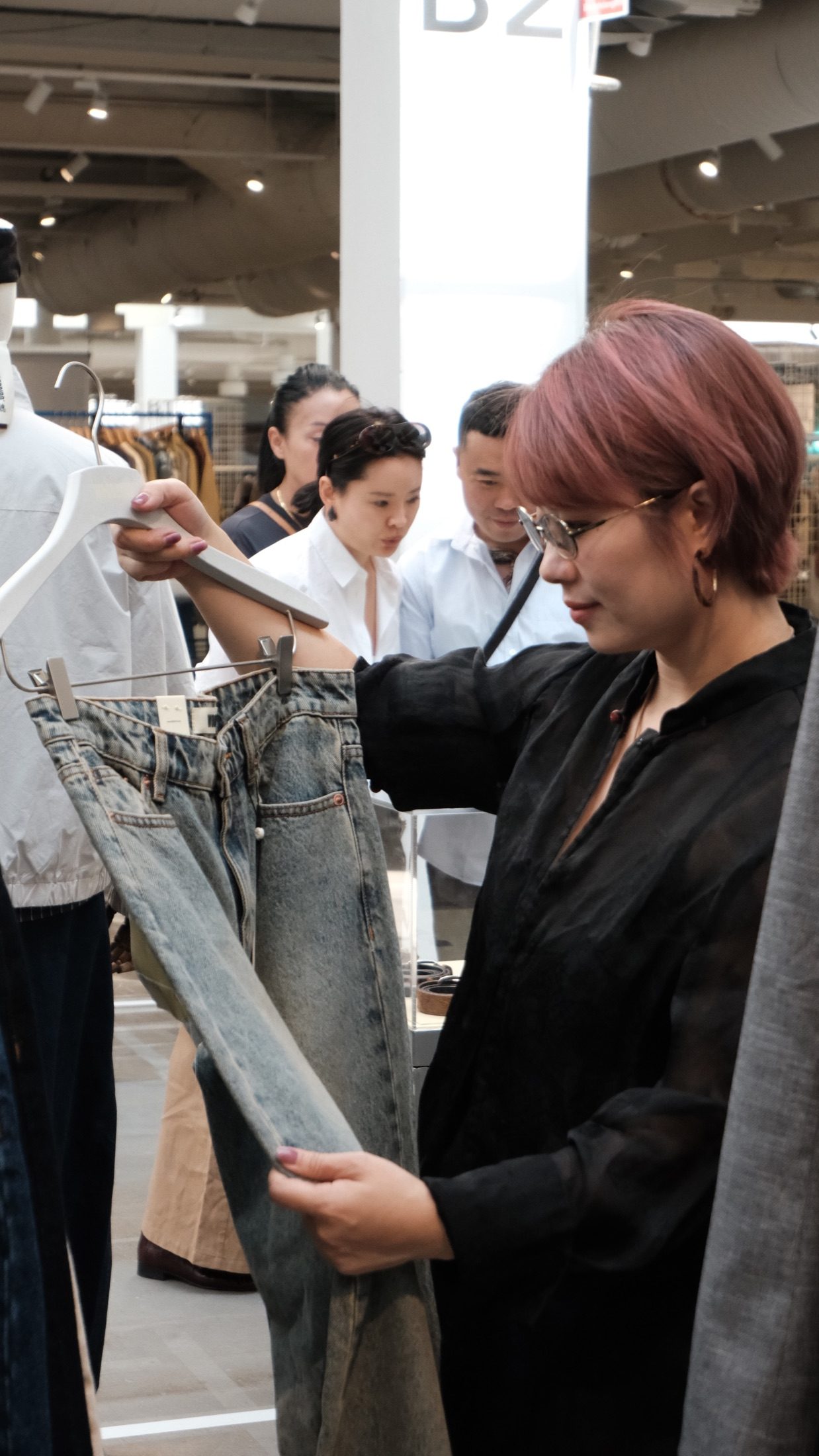 Chinese fashion buyer selecting new-season products at CIFF Copenhagen